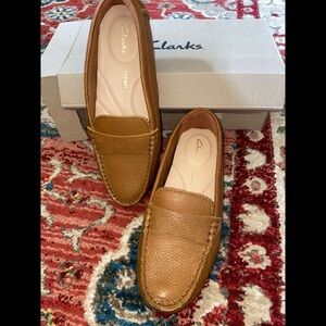 Brand new Women’s office wear Tan coloured Clarks Moccasin Shoes in size 5.5